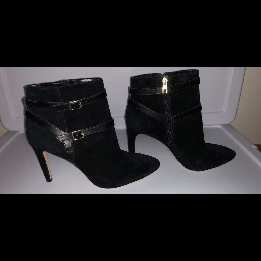 Booties; black; leather; buckles; straps